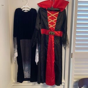 2 Halloween costumes.Child 7/8 one is vampire, other could be witch /vampire.